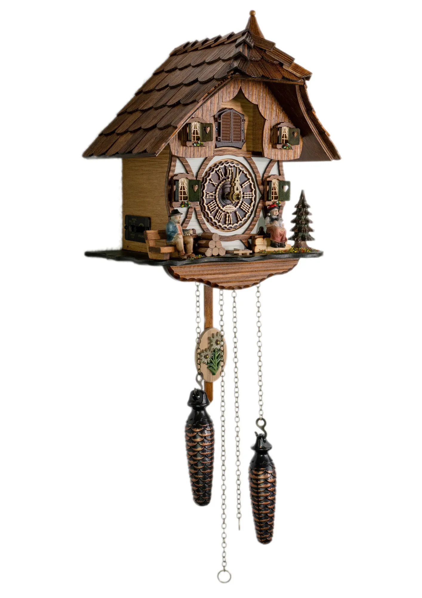 Cuckoo Clock Black Forest Couple Battery (2) Battery cuckoo clock with a black forest couple in front of the chalet house plays music made by Trenkle Uhren