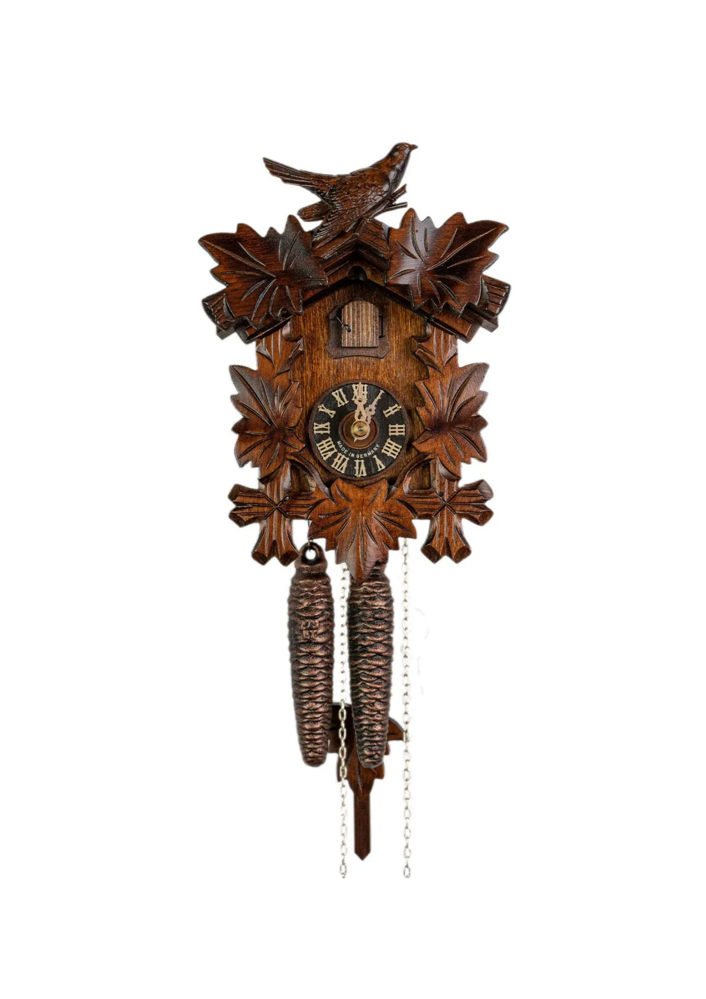 original authentic tiny brown black forest cuckoo clock with a cuckoo bird on top made by Hönes
