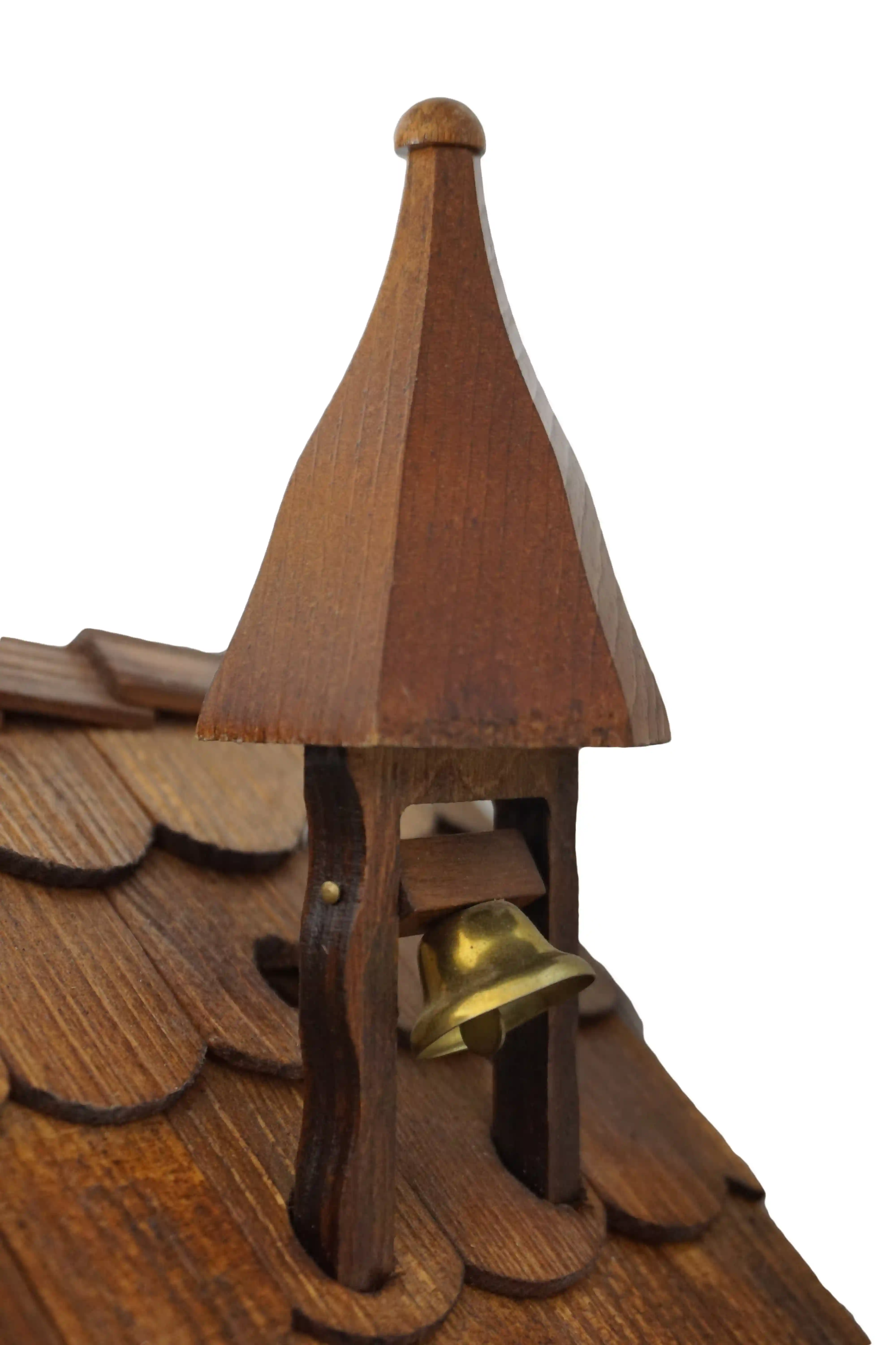 Cuckoo Clock Bell Ringer 1 Day Movement Music (7) Chalet style authentic mechanical black forest cuckoo clock with shingle roof, church tower bell and black forest lady wearing traditional clothing, the lady rings the bell together with the cuckoo sound, music plays dancers dance and water wheel turns