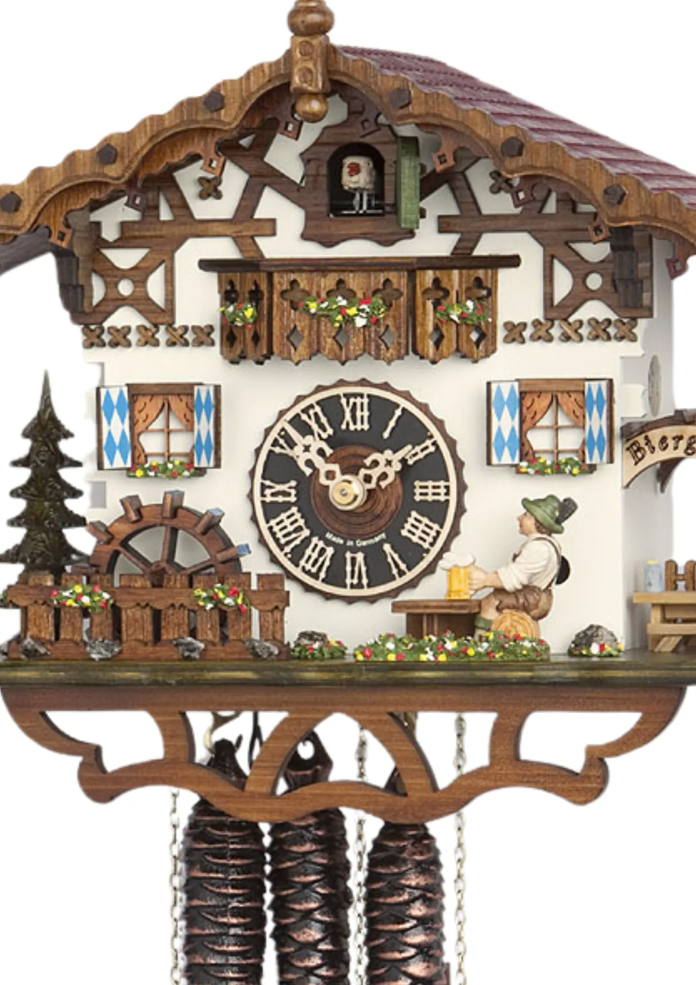 Cuckoo Clock Bavaria - Beer Drinker 1 Day Movement (2) Small mechanical black forest cuckoo clock with music decorated in Bavarian October Fest style with a beer drinker hitting the beer stein on the table as the music plays, water wheel turns but clock has no dacners made by Hönes