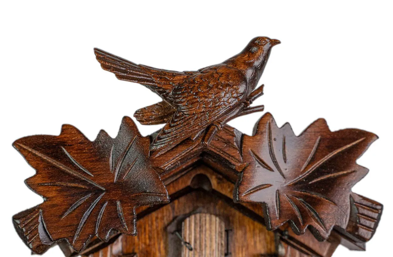 Cuckoo Clock Small Traditional Style 1 Day Movement (5) original authentic tiny brown black forest cuckoo clock with a cuckoo bird on top made by Hönes