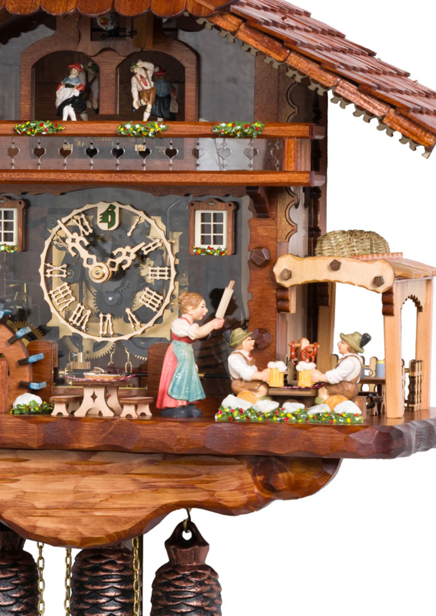 Authentic mechanical large coloful black forest cuckoo clock with transparent plexiglass and visible inside movement. It displays two beer drinkers in the beer garden and the lady with a rolling pin. As the music is playing dancers dance, water wheel turn