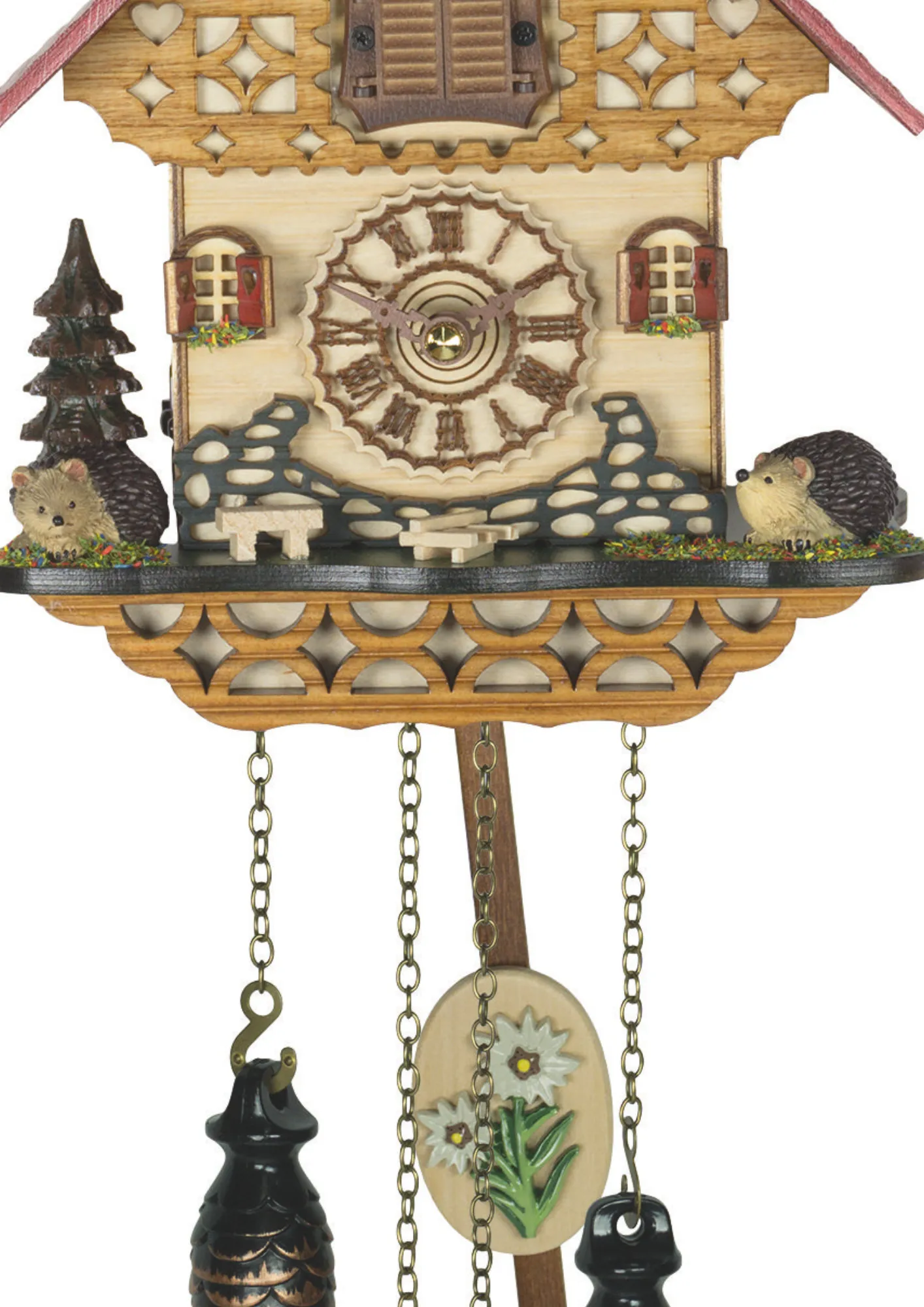 This cute little chalet-style clock shows round little hedgehogs sniffing their way around a house plays music made by Trenkle Uhren