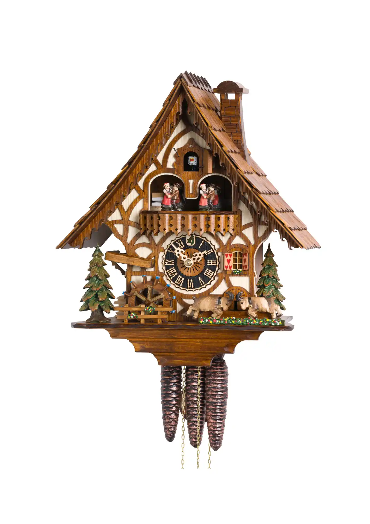 A chalet-style Black Forest cuckoo clock with fine details and two mountain goats sparring in the front. Dancers dance, water wheel turns and the goats are bumping their heads as the music plays. Made by Hönes