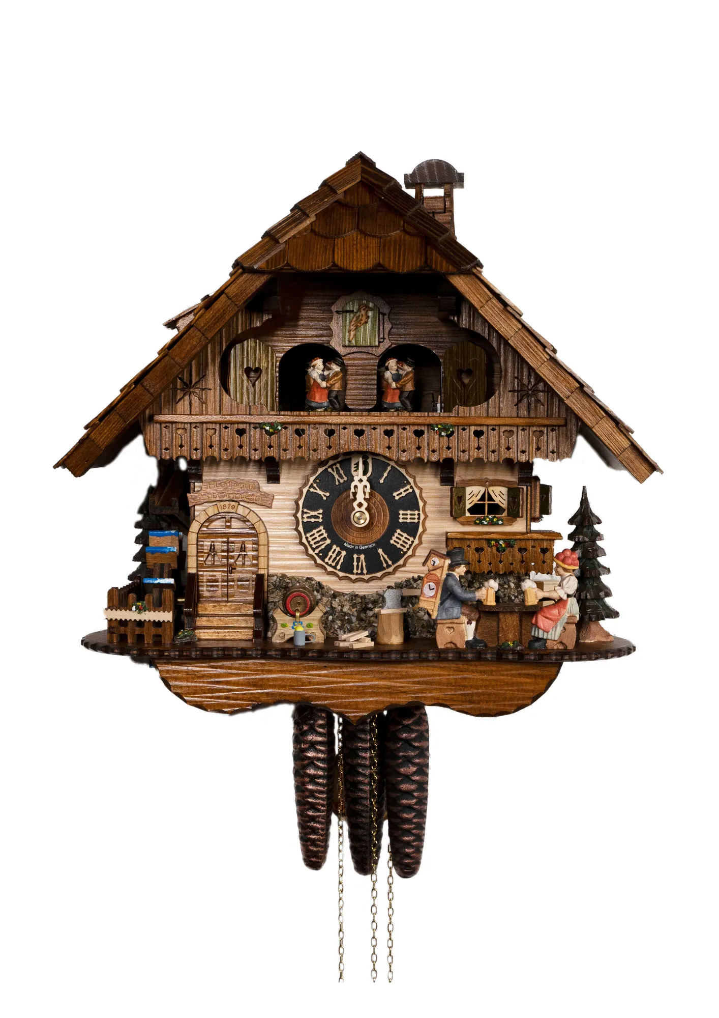Lovely black forest mechanical cuckoo clock with a beer a black forest lady in tradtional dress together with cuckoo clock salesman drinking a beer in front of the chalet house that carries our name Hofgut Sternen. As the music plays they hit beer steins 