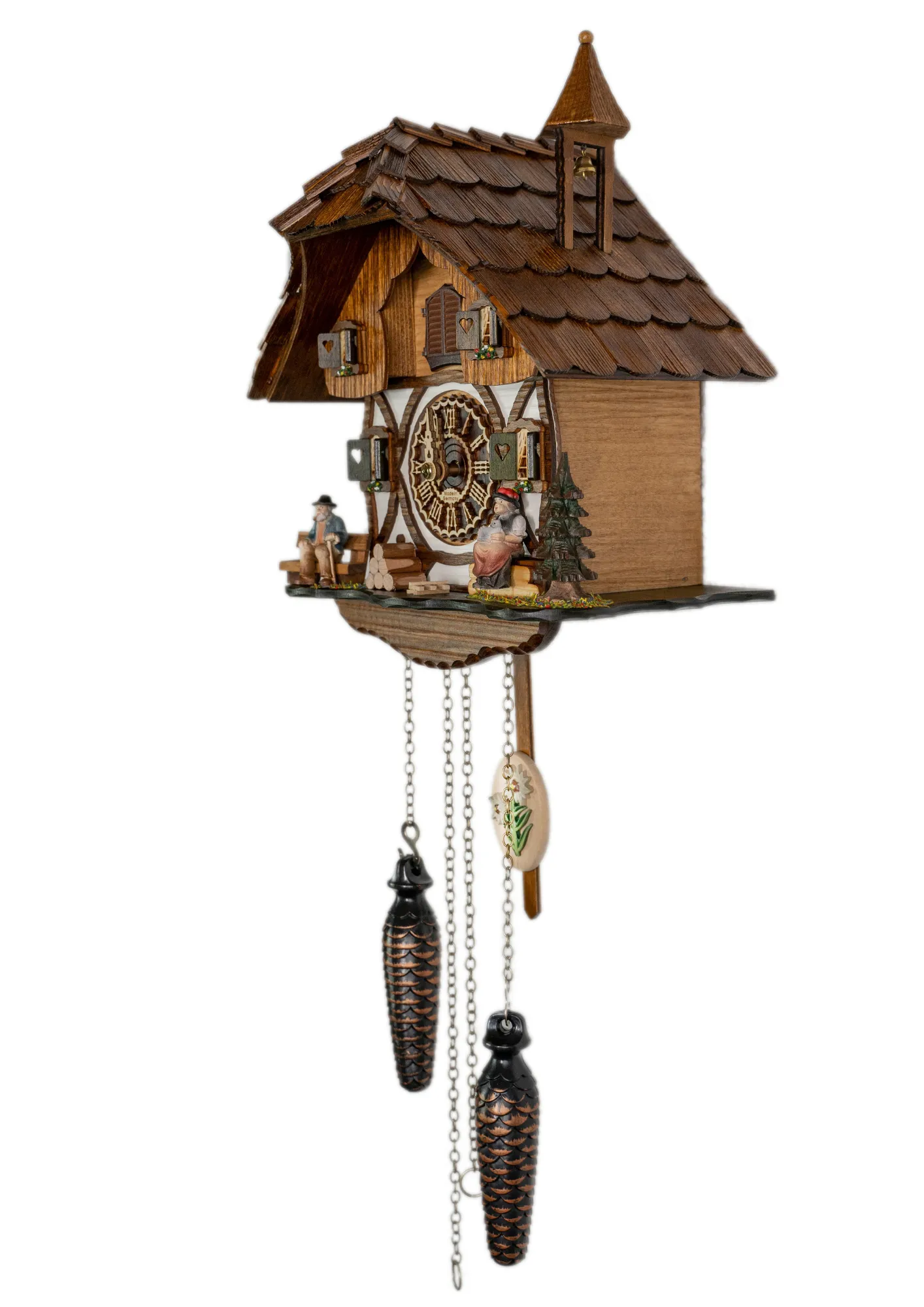 Cuckoo Clock Black Forest Couple Battery (3) Battery cuckoo clock with a black forest couple in front of the chalet house plays music made by Trenkle Uhren