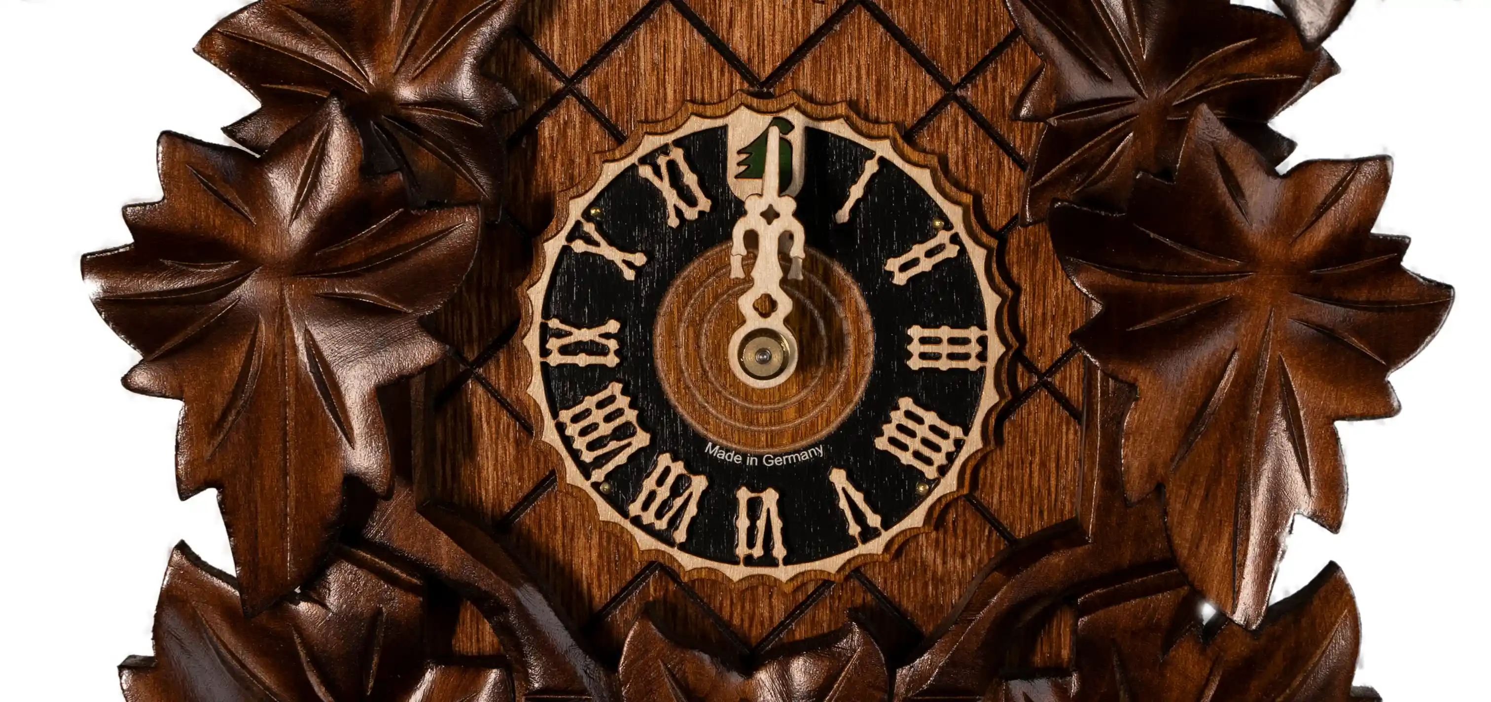 original authentic  brown black forest cuckoo clock decorated with wine leaves made by Hönes